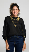 Blusa Talisman de algodón 100 por ciento con mangas drapeadas e ilustración en serigrafia