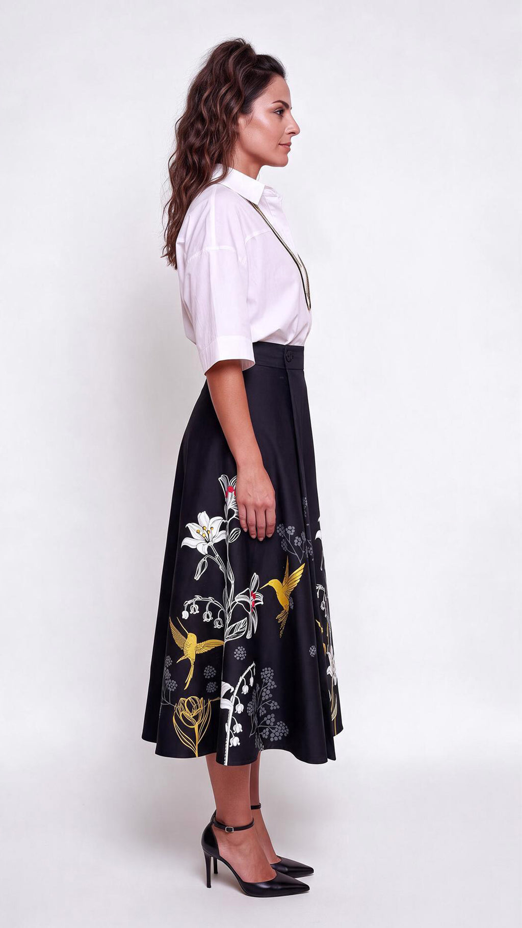 Falda COLIBRÍ, de silueta envolvente ,  talla única, y se ajusta con botones en la cintura.
